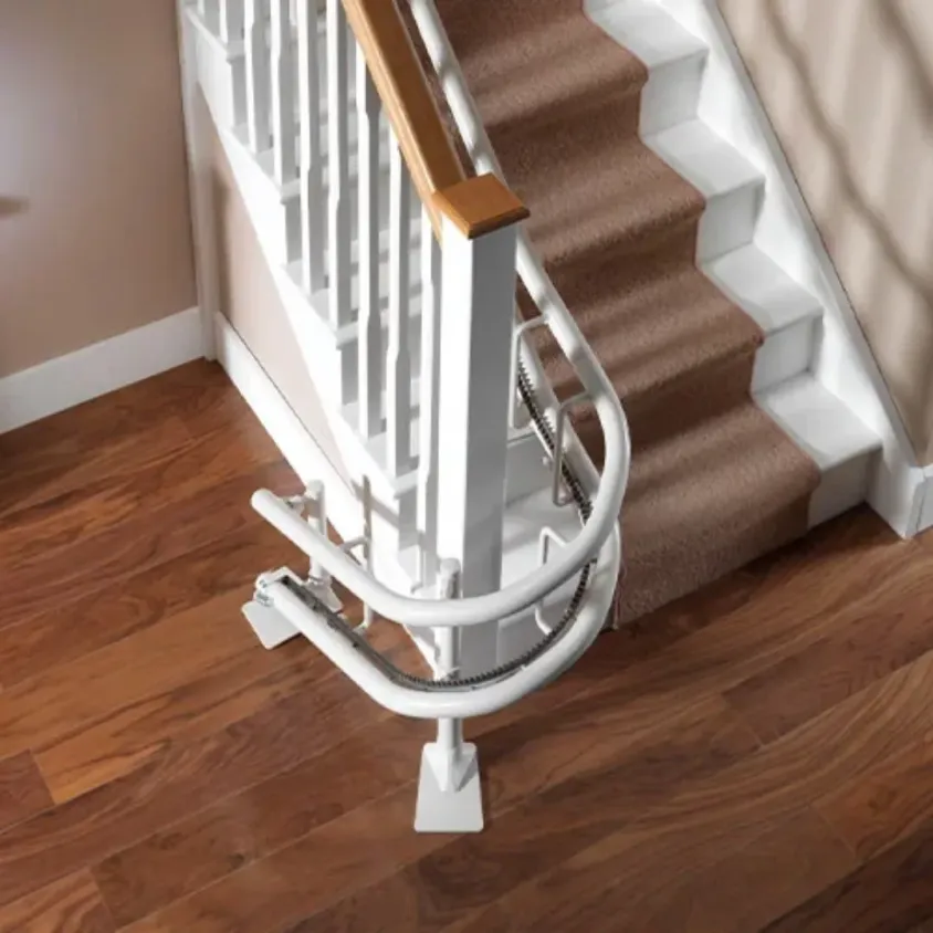 Monte-escalier Tournant Stannah | Prix & Installation sur mesure